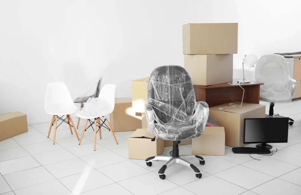 moving-cardboard-boxes-personal-belongings-empty-office-space (1)